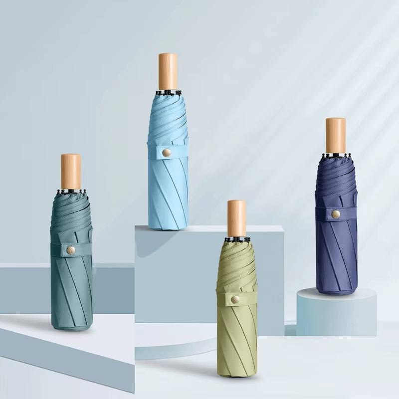 Umbrelă de ploaie minimalistă în trei ori